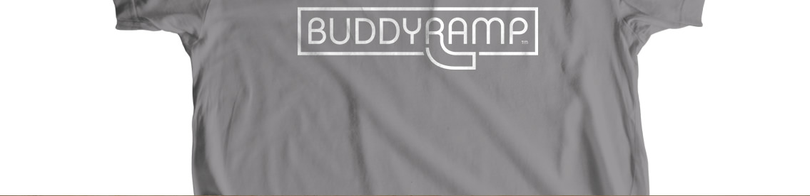 The bottom section of a grey t-shirt with “Buddy Ramp” written on it.