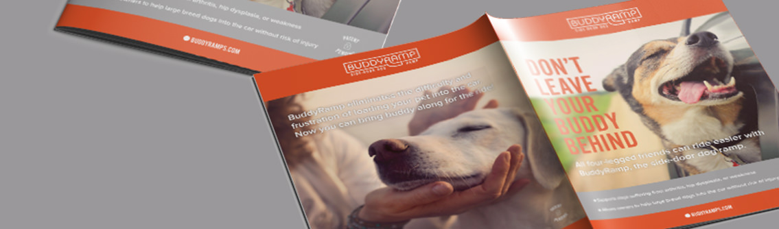 Another angle of two brochures with a photo of a dog and text reading, “Don’t leave your buddy behind.”