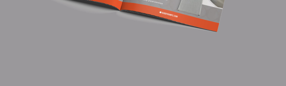 Grey background and the bottom slice of a brochure.
