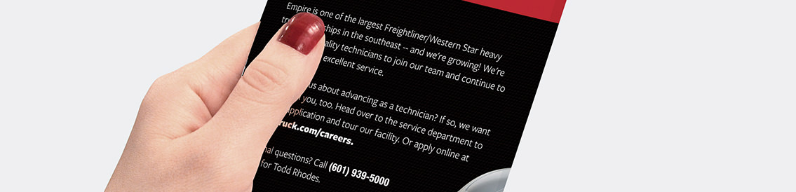 Demonstration of a hand holding the flyer.