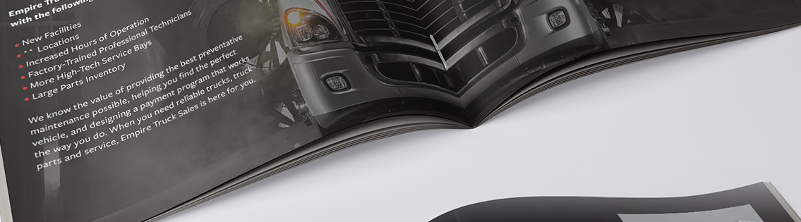 Bottom section of an open brochure with text discussing Empire Truck Sales’ services.