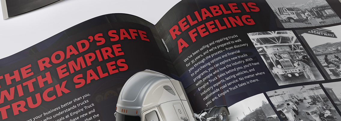 Open pages of brochure with text reading, “The Road’s Safe With Empire Truck Sales” and “Reliable Is A Feeling.”