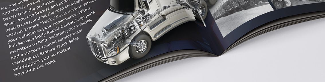 Bottom section of open brochure with image of a truck engine.