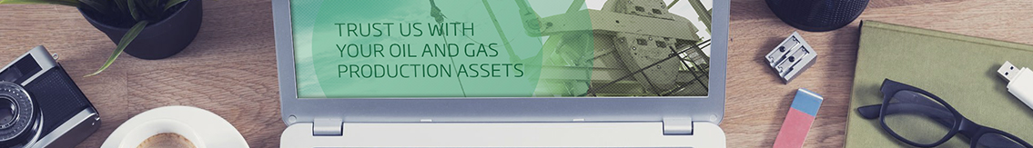 Bottom half of laptop screen and various stationery and paraphernalia.