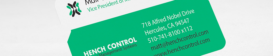 Address information from Hench Control business card, created by Entermotion Design Studio.