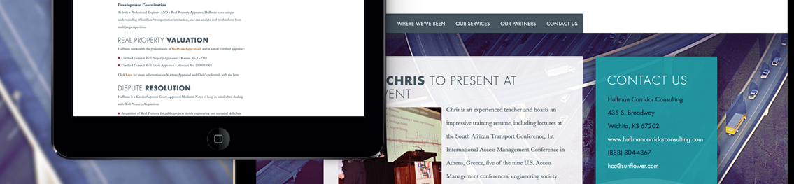 Mobile device displaying Huffman Corridor Consulting website with the website displayed as the background.