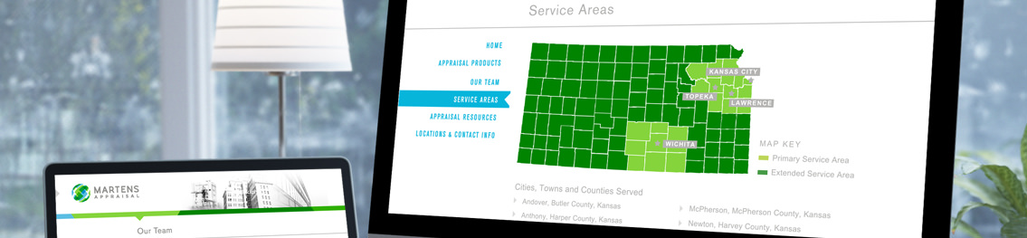 A large monitor and laptop both of which are showcasing the Martens Appraisal website.