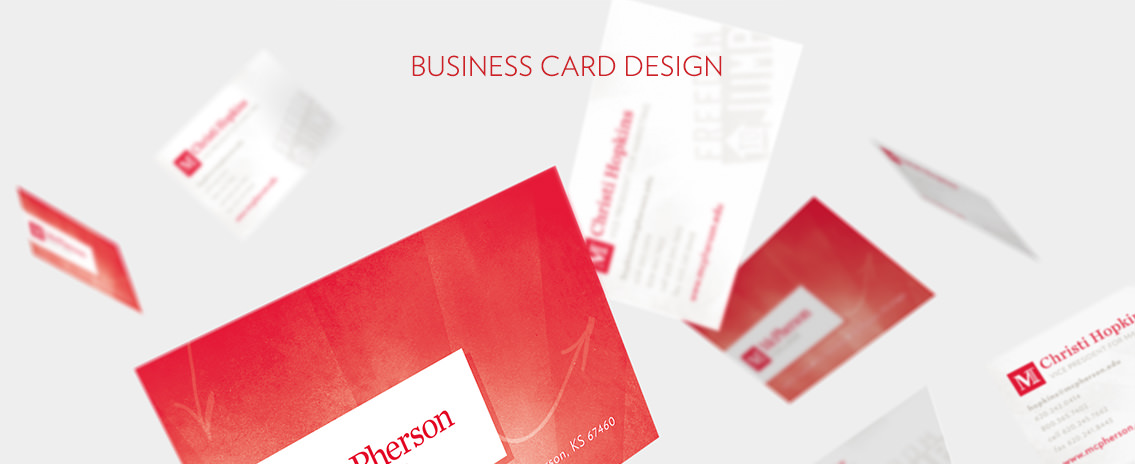 Close-up of red business cards and business card text for McPherson College employees.
