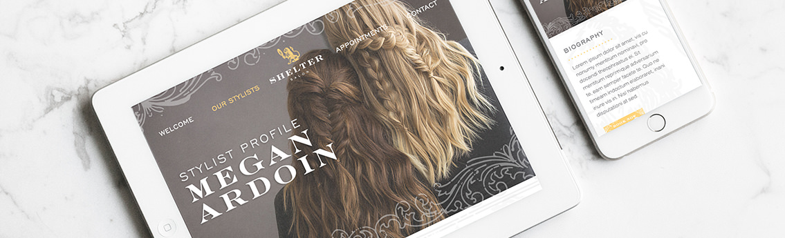 Two women with braided hair on iPad.