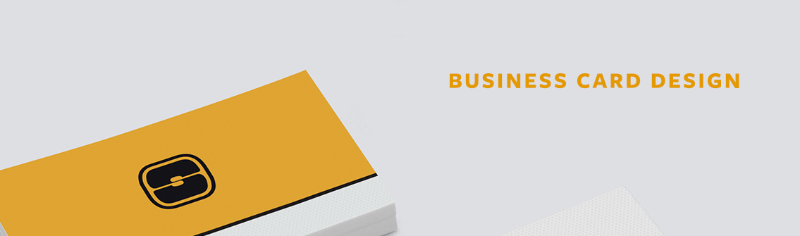 Text reading “Business Card Design” with a stack of white and yellow business cards.