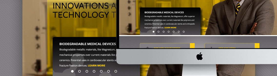 Background and monitor demonstrating the website and homepage of WSU Ventures.
