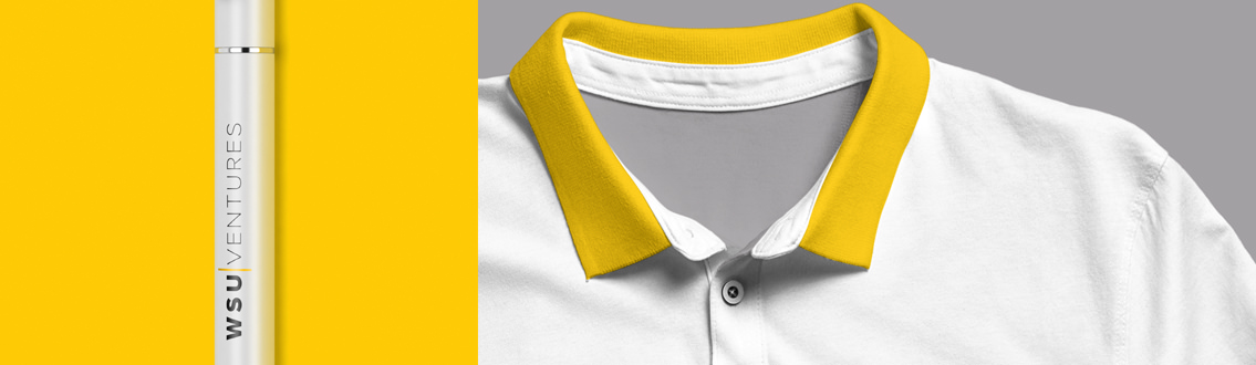 The barrel of a pen with WSU Ventures’ logo and a white shirt with yellow collar.