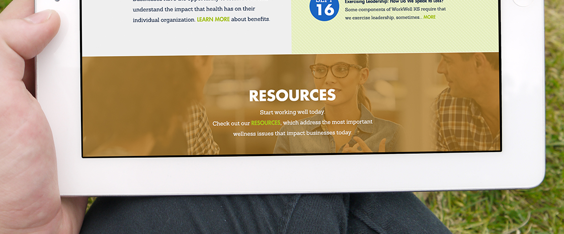 View of WorkWell Kansas' website on tablet, designed by Entermotion, a Wichita web-design studio.