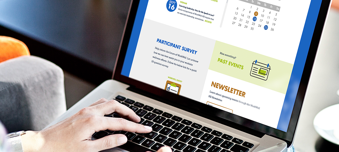 View of WorkWell Kansas' website on laptop, designed by Entermotion, a Wichita web-design studio.