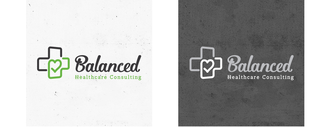 Detail of logo designed by Entermotion, featuring a half green half black medical cross with a stylized heart inside.
