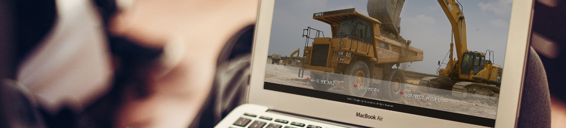 Bergkamp's website designed by Entermotion, displayed on MackBook Air.