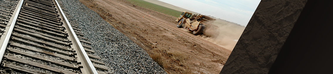 Close up of railroad tracks at construction site.