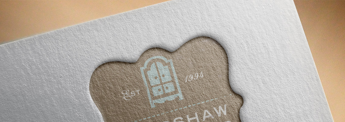 Close-up view of Bradshaw Kirchofer's embossed logo, designed by Entermotion, a Wichita web-design studio.