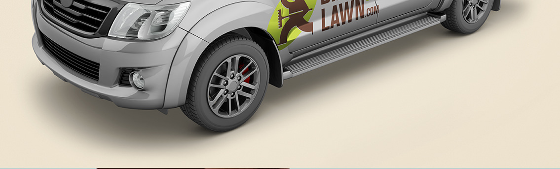 Wheels of truck and one slice of truck featuring a man running with lawn equipment.