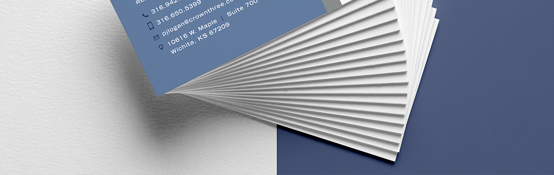View of Crown Three Realty's business card design, designed by Entermotion, a Wichita web-design studio.
