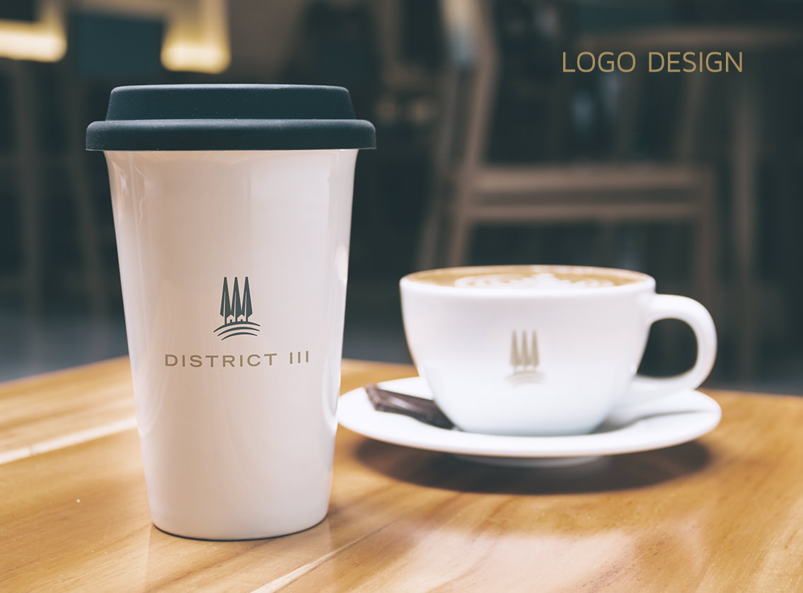 District III logo, featuring 3 tree silhouettes, on coffee cup and coffee mug.