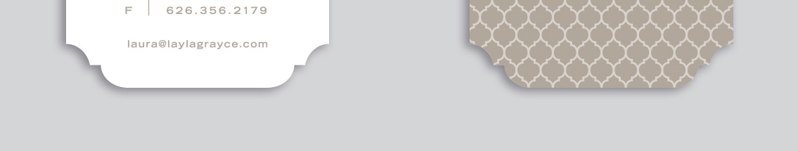 Bottom of Layla Grayce business card, showing phone number and email address next to patterned business card.