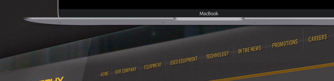 Black background with detail of MacBook.