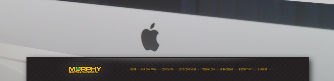 Detail of Apple logo on computer.