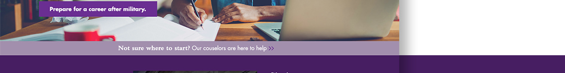 Man writing at table.