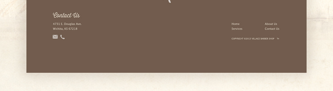 Detail of contact footer on Village Barber Shop website.